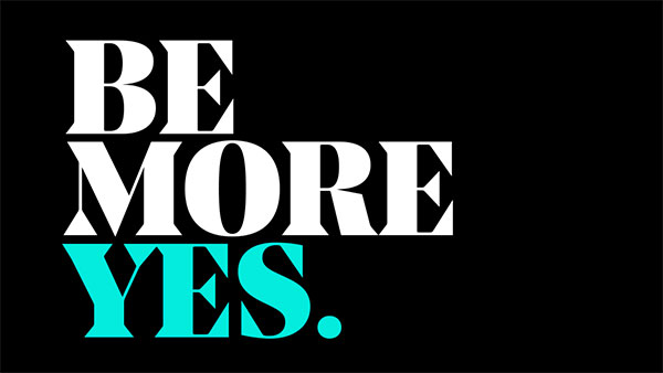 Text in bold capital letters on a black background reads "BE MORE YES." with "YES." in bright turquoise color.
