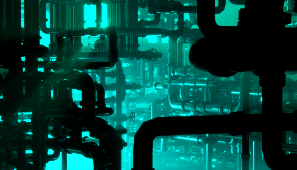 A complex network of interconnected pipes with various bends and angles, silhouetted against a bright turquoise background. The scene has an industrial and futuristic feel, with light reflecting off the surfaces.