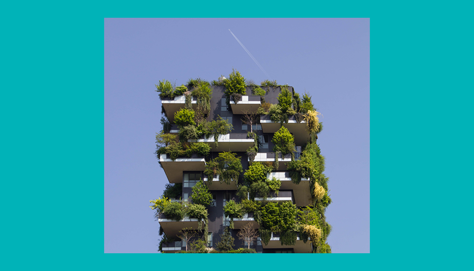 A modern high-rise building with balconies densely planted with various green trees and shrubs. The blue sky and a white airplane contrail are in the background. The image is bordered by a teal frame.