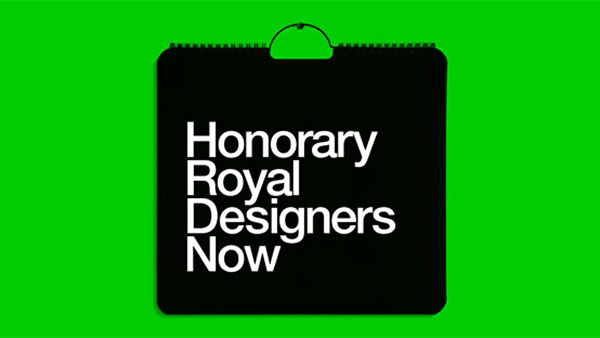 A black square with the text "Honorary Royal Designers Now" in white, set against a bright green background. A circular handle at the top suggests it might be a calendar or display card.