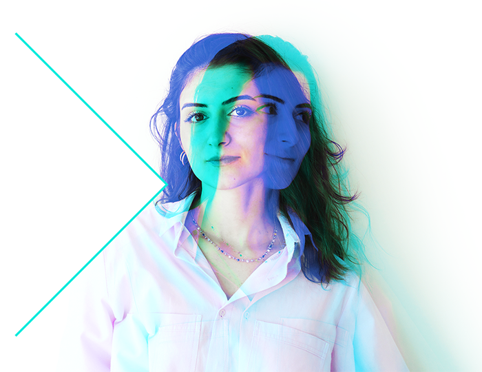 A woman with layered blue and pink color filters on her face and upper body, creating a double exposure effect. She wears a light-colored shirt and necklace, standing against a white background intersected by a diagonal turquoise line.