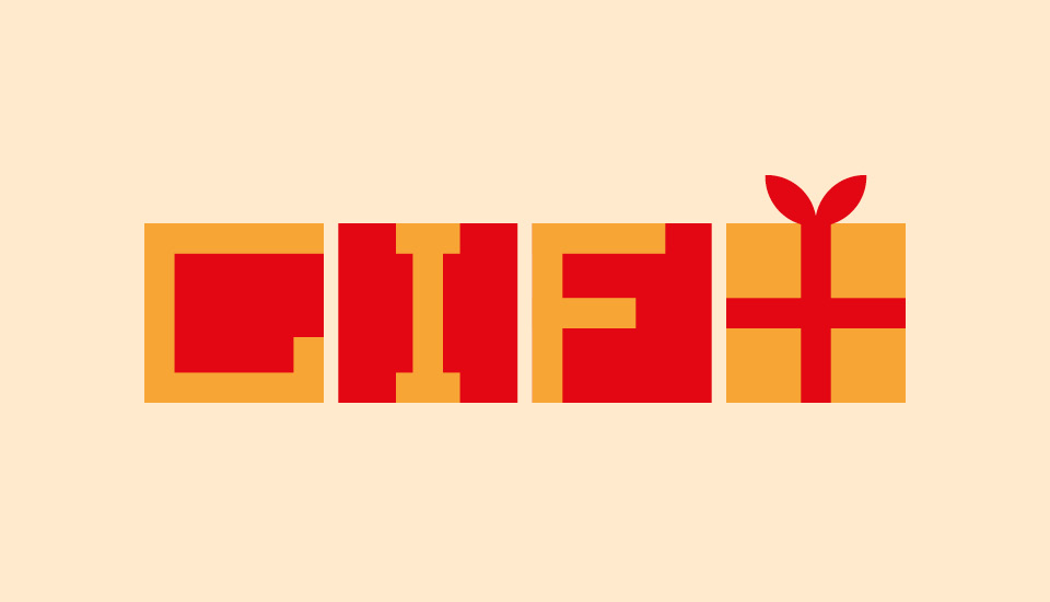The image spells out the word "GIFT" using stylized block letters. Each letter resembles a wrapped present with varying red and orange colors. The letter "T" has a bow on top, adding to the gift-like appearance.