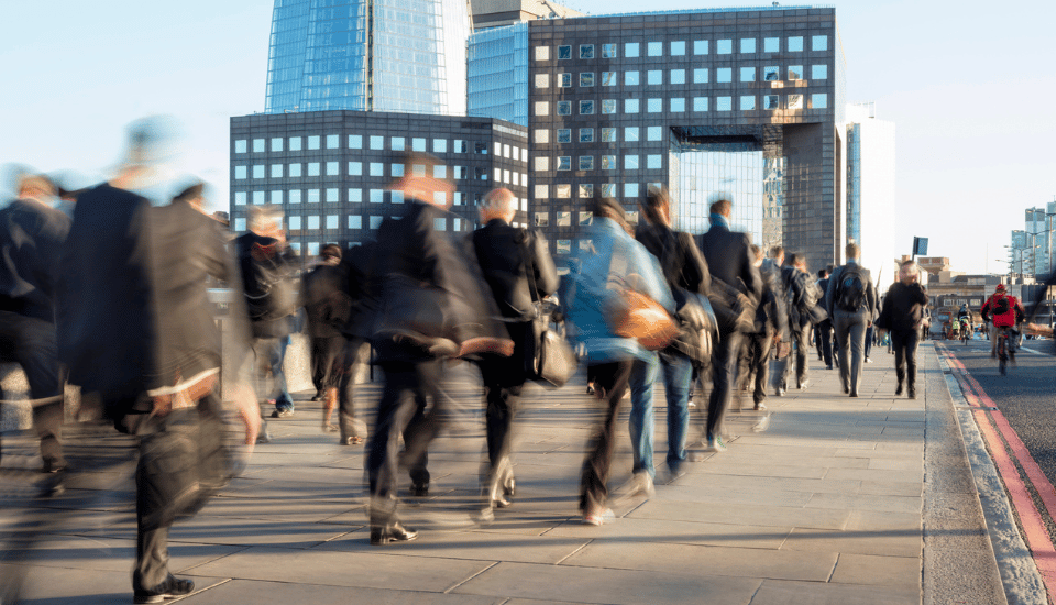 People walking through London.
