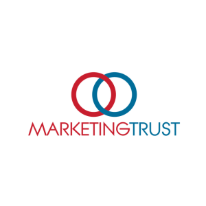 Two interlocking circles, one red and one blue, above the words "MARKETING TRUST." The text "MARKETING" is in red, and "TRUST" is in blue, set against a white background.
