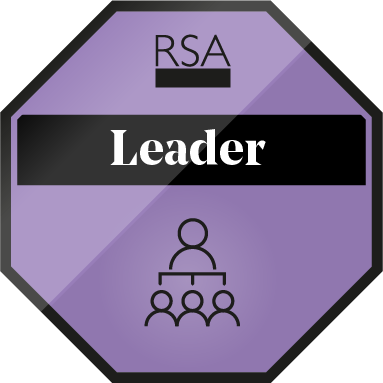 Octagonal badge with a purple background. It features the text "Leader" in bold white on a black strip and "RSA" at the top. Below, icons of a person atop a tree diagram with three people underneath are depicted.