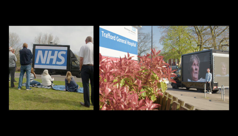 Two photos: Left, people watch a large outdoor screen displaying "NHS." Right, a screen outside Trafford General Hospital shows a woman's face near red-leaved plants and parked vehicles.