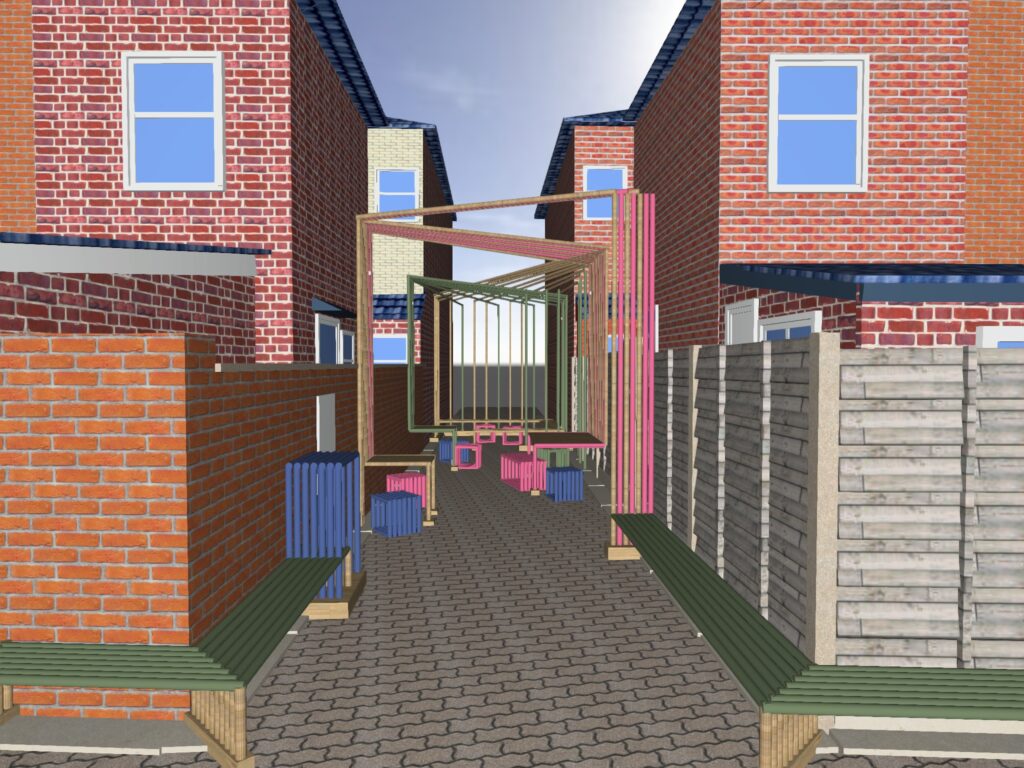 A paved alleyway between brick and wooden fences, with colorful benches and geometric wooden frames forming a tunnel-like structure, set between two rows of red brick houses with blue windows.